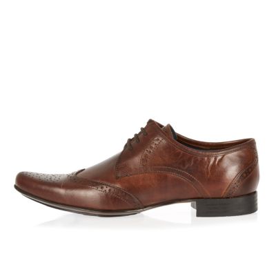 Brown leather pointed brogues